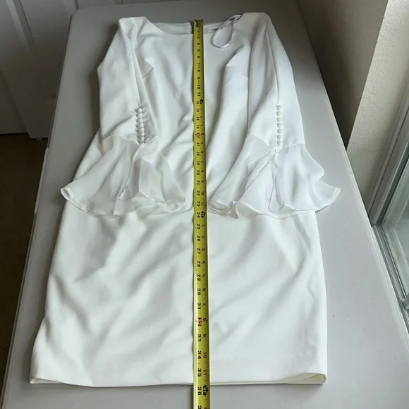 Elegant Calvin Klein White Dress with Flared Sleeves. - Picture 6 of 15